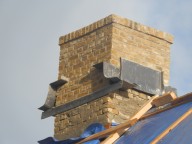 Nieuwe schoorsteen op boerderij te Stolwijk